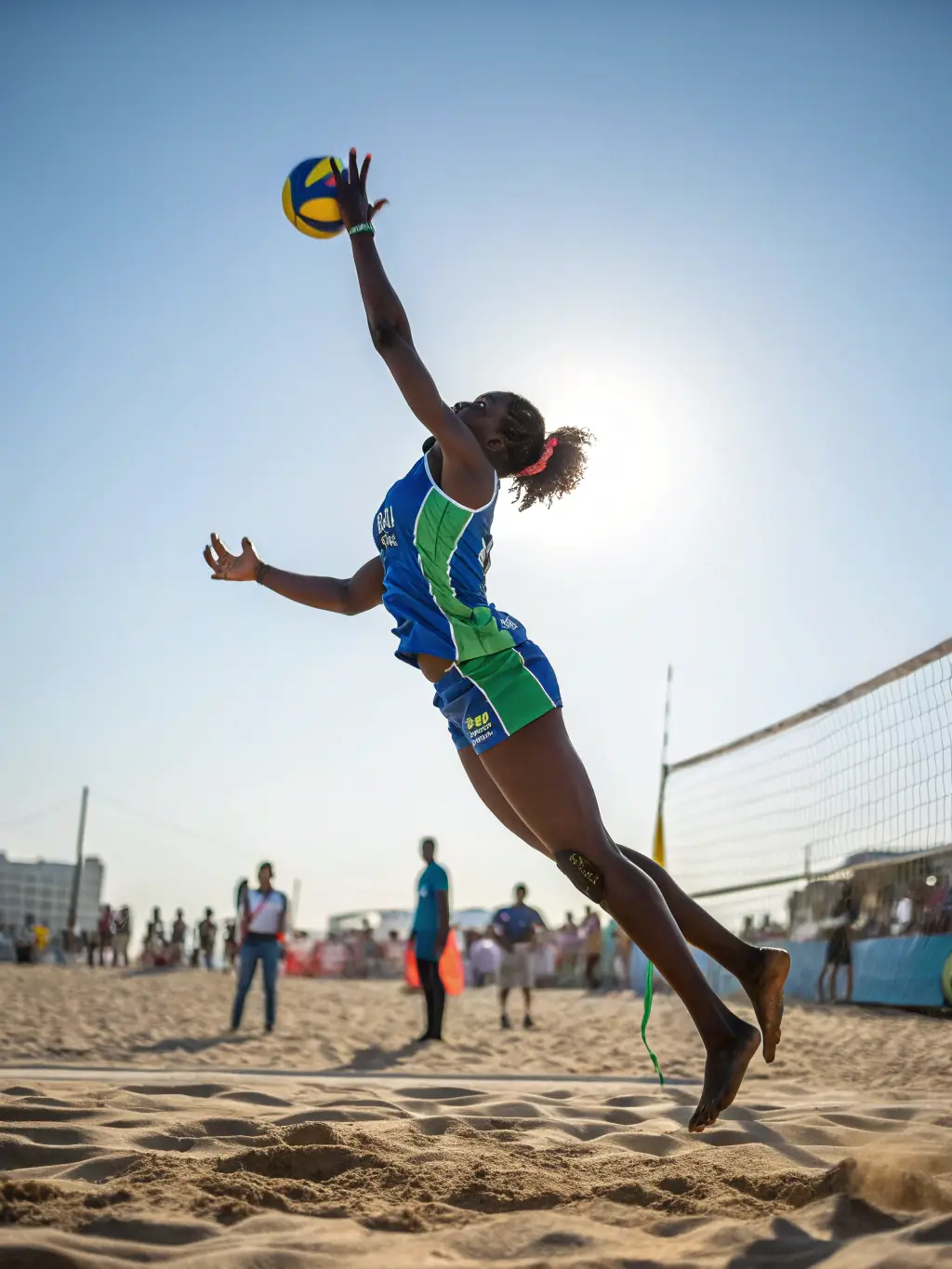 A person jumping high to spike a volleyball, showcasing the physical fitness and agility required in the sport.